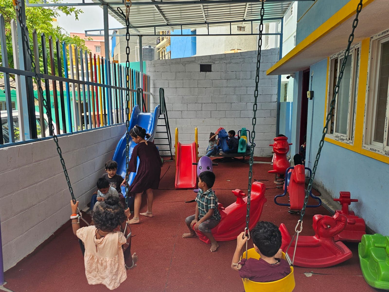 Kids Playing on Swings