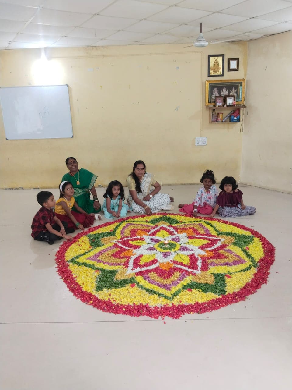 Flower rangoli with diya